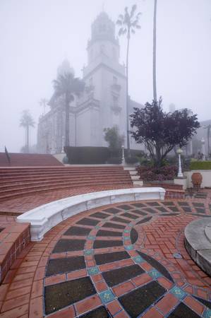 "Hearst Castle, ""America's Castle,"" in a fog with palm trees, San Simeon, Central California Coast"のeditorial素材