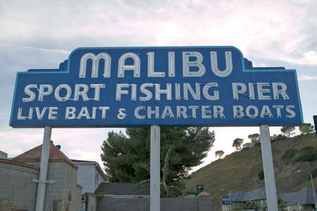 The ÒMalibu Sport Fishing PierÓ sign at the newly remodeled Malibu Pier, Malibu, Californiaのeditorial素材