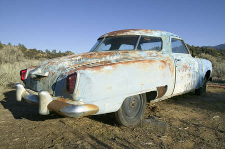 Junk early 50's blue Studebaker deserted in field off highway 33, near Cuyama Californiaのeditorial素材