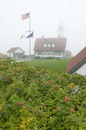 Fog shrouds the Portland Head Lighthouse in Cape Elizabeth, Maineのeditorial素材