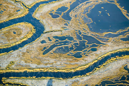 Aerial view of marsh, wetland abstraction of salt and seawater, and Rachel Carson Wildlife Sanctuary in Wells, Maineのeditorial素材