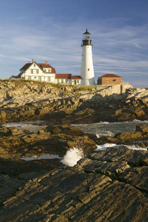 Sunrise view of Portland Head Lighthouse and ocean wave, Cape Elizabeth, Maineのeditorial素材