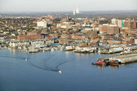 Aerial of downtown Portland Harbor and Portland Maine with view of Maine Medical Center, Commercial street, Old Port and Back Bay.のeditorial素材