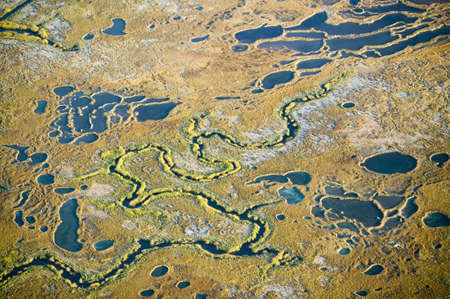 Aerial view of marsh, wetland abstraction of salt and seawater, and Rachel Carson Wildlife Sanctuary in Wells, Maineのeditorial素材