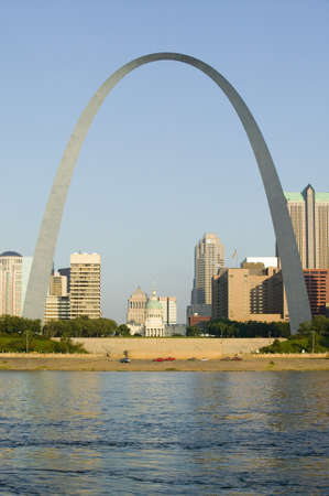 Daytime view of Gateway Arch ("Gateway to the West") and skyline of St. Louis, Missouri at sunrise from East St. Louis, Illinois on the Mississippi Riverのeditorial素材