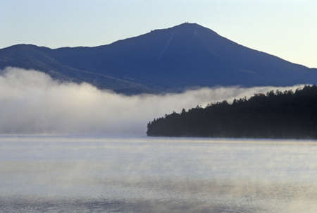 Lake Placid with fog at sunrise, NYのeditorial素材