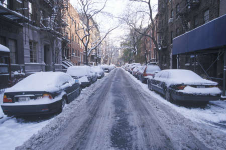 Snow covered car in streets of Manhattan, New York City, NY after winter snowstormのeditorial素材