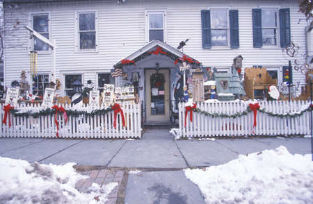 Antique store in winter with Christmas decor  on display in front of house, New Jerseyのeditorial素材