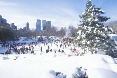 Ice skating Wollman Rink in Central Park, Manhattan, New York City, NY after winter snowstormのeditorial素材