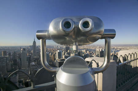 Viewer scope to look at panoramic view of New York City from ÒTop of the RockÓ viewing area at Rockefeller Center, New York City, New Yorkのeditorial素材