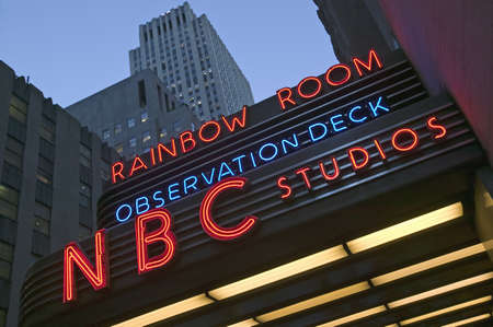 Foto de Neon lights of NBC Studios and Rainbow Room at Rockefeller Center, New York City, New York - Imagen libre de derechos