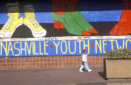 Nashville Youth Network mural with young African American girl in foregroundのeditorial素材