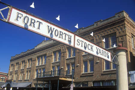Banner at the Fort Worth Stock Yards with historic hotel, Ft. Worth, TXのeditorial素材