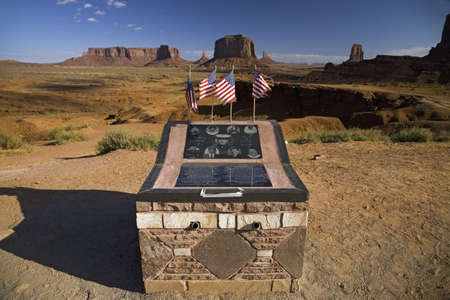 Military monument to fallen solider seen amongst red buttes of Monument Valley Navajo Tribal Park, Southern Utah near Arizona borderのeditorial素材