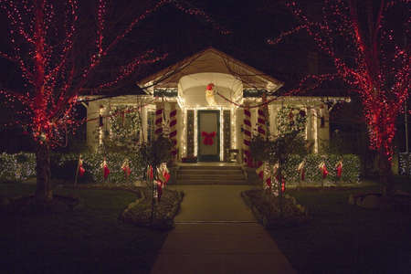Christmas lights and deer in front of house in Oxnard, Californiaのeditorial素材
