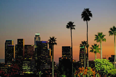 Palm trees at sunset rise above Los Angeles skyline as seen from Dodger Stadium during NLCS baseball series, October 12, 2008のeditorial素材