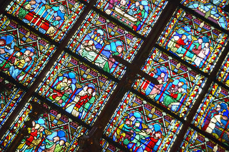 Stained glass windows inside the Notre Dame Cathedral, Paris, Franceのeditorial素材