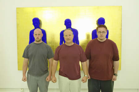 Painters stand in front of sculpture of Yves Klein, the Museum of Modern and Contemporary Art of...