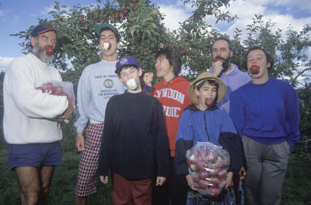 Family eating apples in VT