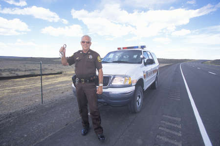 County sheriff with handcuffs, New Mexicoのeditorial素材