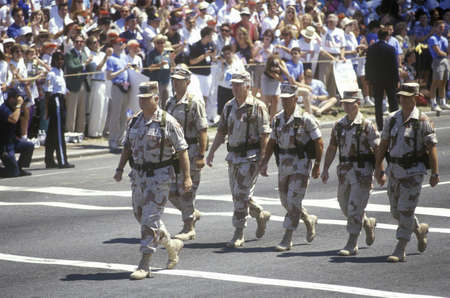 General Schwarzkopf walks at the head of the Desert Storm Victory Parade down the streets of...