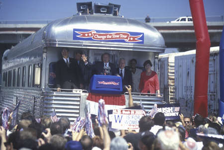 George W. Bush, Mrs. Bush and politicians viewed by spectators at Oxnard, CA train station for campaign whistle-stop tour, 2000のeditorial素材