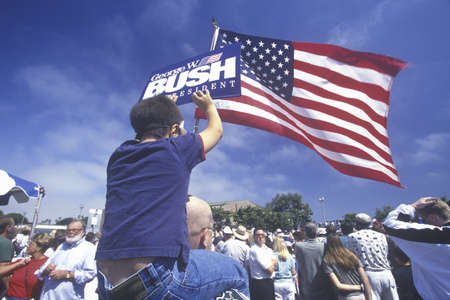 George W. Bush, Mrs. Bush and politicians viewed by spectators at Oxnard, CA train station for campaign whistle-stop tour, 2000のeditorial素材