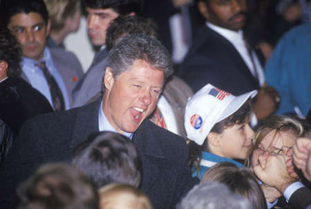Governor Bill Clinton works the crowd at a Michigan campaign rally in 1992 on his final day of campaigning in Detroit, Michiganのeditorial素材