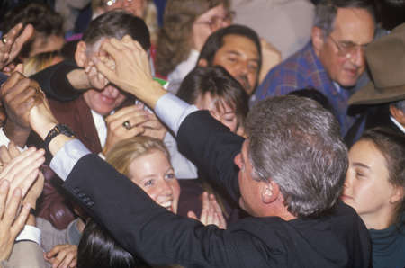 Governor Bill Clinton greets the crowd at a Denver campaign rally in 1992 on his final day of campaigning in Denver, Coloradoのeditorial素材