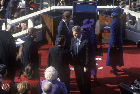 Bill Clinton, 42nd President, shakes hands on Inauguration Day January 20, 1993 in Washington, DCのeditorial素材