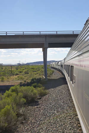 Whistle Stop Kerry Express across America train moving through landscape, American Southwestのeditorial素材