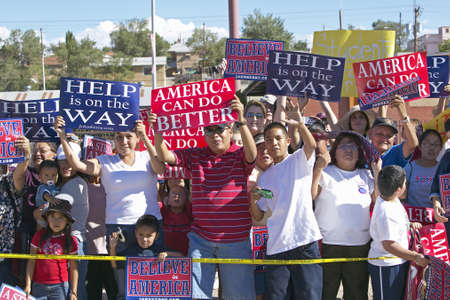 Crowd of native American Kerry Campaign supporters outside with signs,  Gallup, NMのeditorial素材