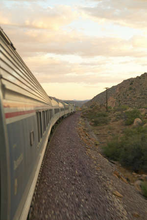 Whistle Stop Kerry Express across America train moving through landscape, American Southwestのeditorial素材