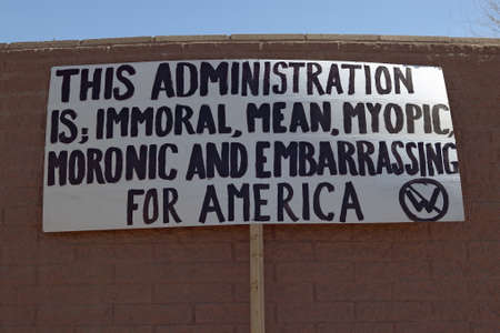 Poster sign protesting the policies of President George W. Bush's administration in Tucson, Arizonaのeditorial素材