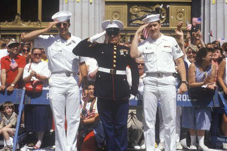 Two American Sailors and a United States Marine Saluting at Parade, Americaのeditorial素材