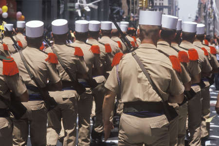 Rear View of Soldiers Marching in Ticker Tape Parade, New York City, New York
