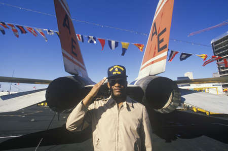 Afro-American Soldier Saluting By Aircraft, USS Forrestal, New Orleans, Louisianaのeditorial素材