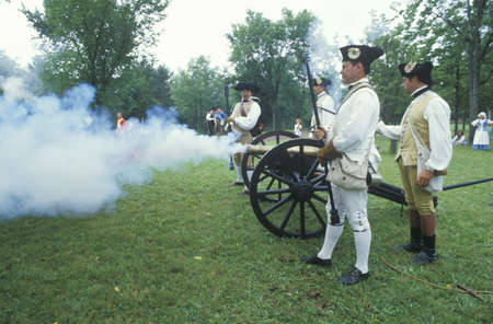 Firing cannons during Historical Revolutionary war reenactment, Daniel Boone Homestead, Continental Army, artillery divisionのeditorial素材