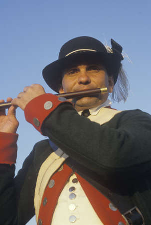 Close up of man playing fife during American Revolutionary war reenactmentのeditorial素材