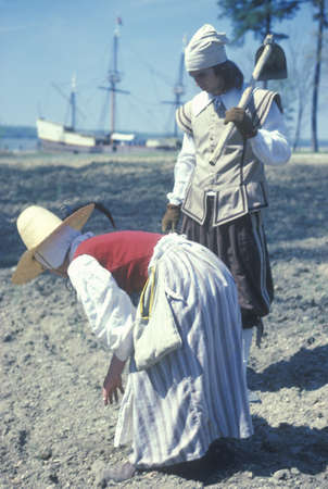 Participants working on beach outside of historic Jamestown, Virginia, site of the first English...