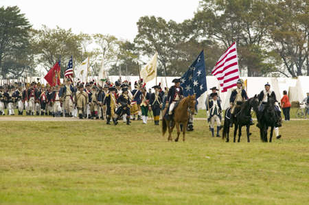 Patriot soldiers march to Surrender Field as part of the 225th Anniversary of the Victory at...