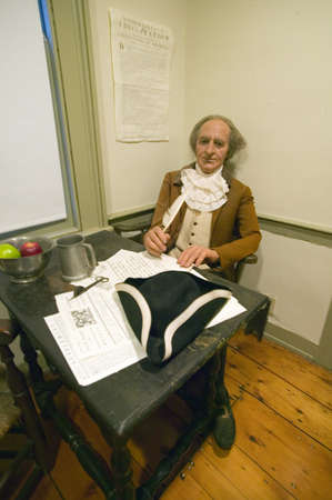Reenactment with prop of Thomas Paine at work in his home in New Rochelle, New York