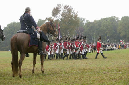 General George Washington salutes British column as they pass at the 225th Anniversary of the Victory at Yorktown, a reenactment of the siege of Yorktown, where General George Washington commanded 17,600 American troops and French Comte de Rochambeau leadのeditorial素材