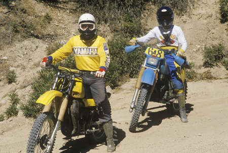 Two dirt bike riders on their off-road motorcyclesのeditorial素材