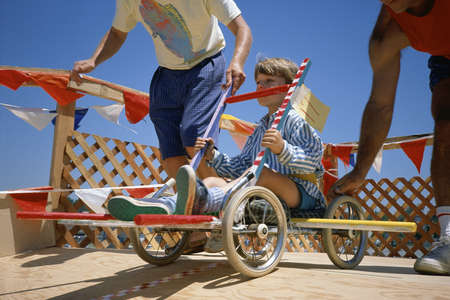 Boy in go-cart at starting gateのeditorial素材