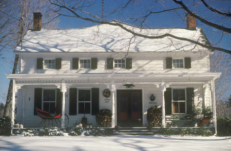 Snow covered two-story home at Christmas, Woodstock, NYのeditorial素材