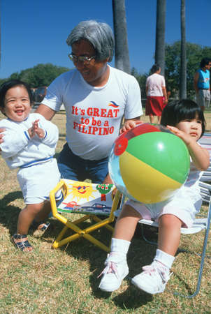 Filipino grandfather with his grandchildren, Santa Barbara, CAのeditorial素材
