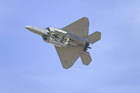 US Air Force F-22A Raptor Jet Fighter flying at the 42nd Naval Base Ventura County (NBVC) Air Show at Point Mugu, Ventura County, Southern California.のeditorial素材