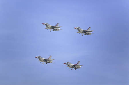 Four US Air Force F-16C Fighting Falcons, known as the Thunderbirds, flying in formation over the 42nd Naval Base Ventura County (NBVC) Air Show at Point Mugu, Ventura County, Southern California.のeditorial素材