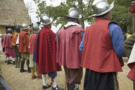 English reenactor soldiers standing guard at James Fort, Jamestown Settlement, on the 400th...